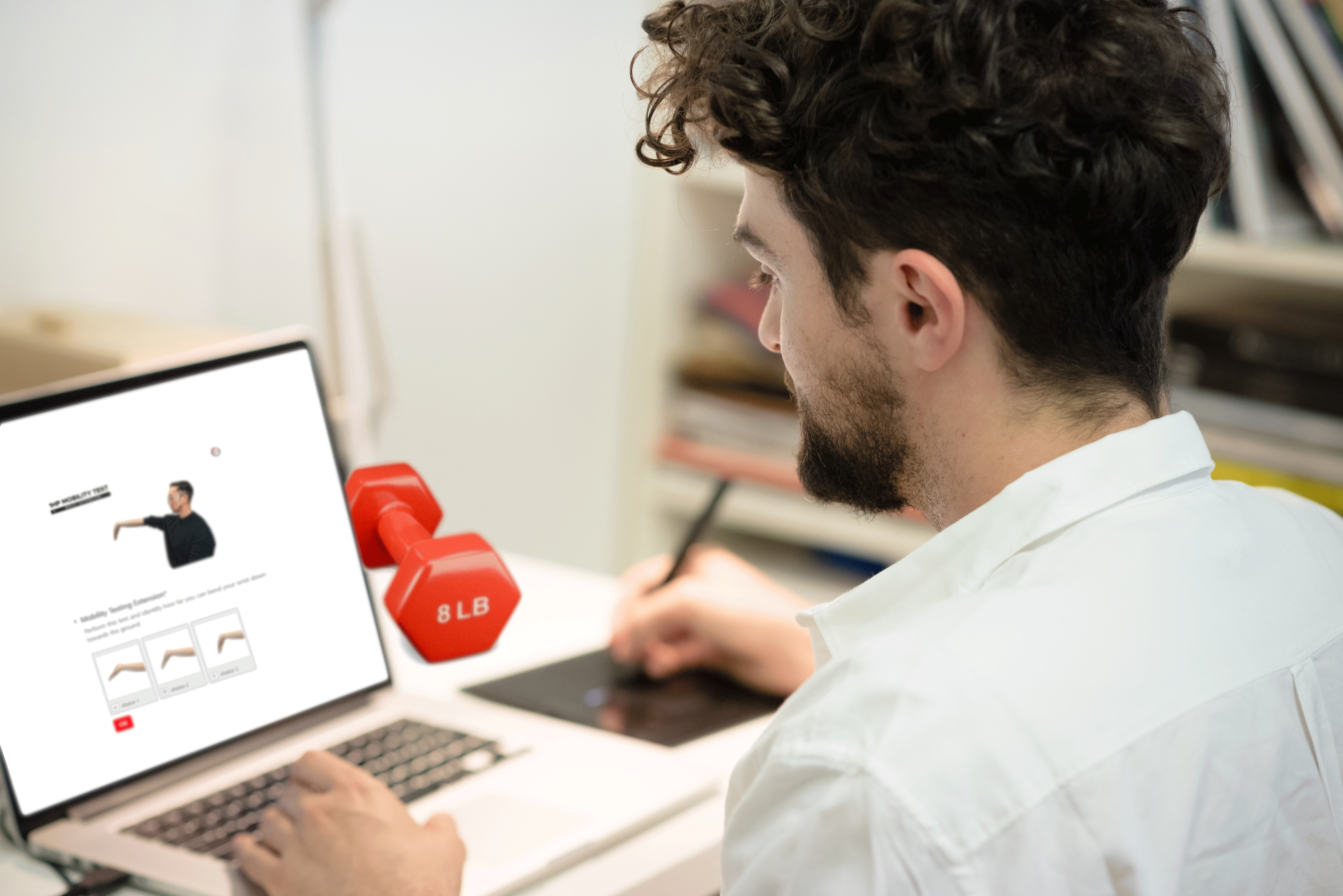 Person using laptop - 1HP Wrist Pain Blueprint